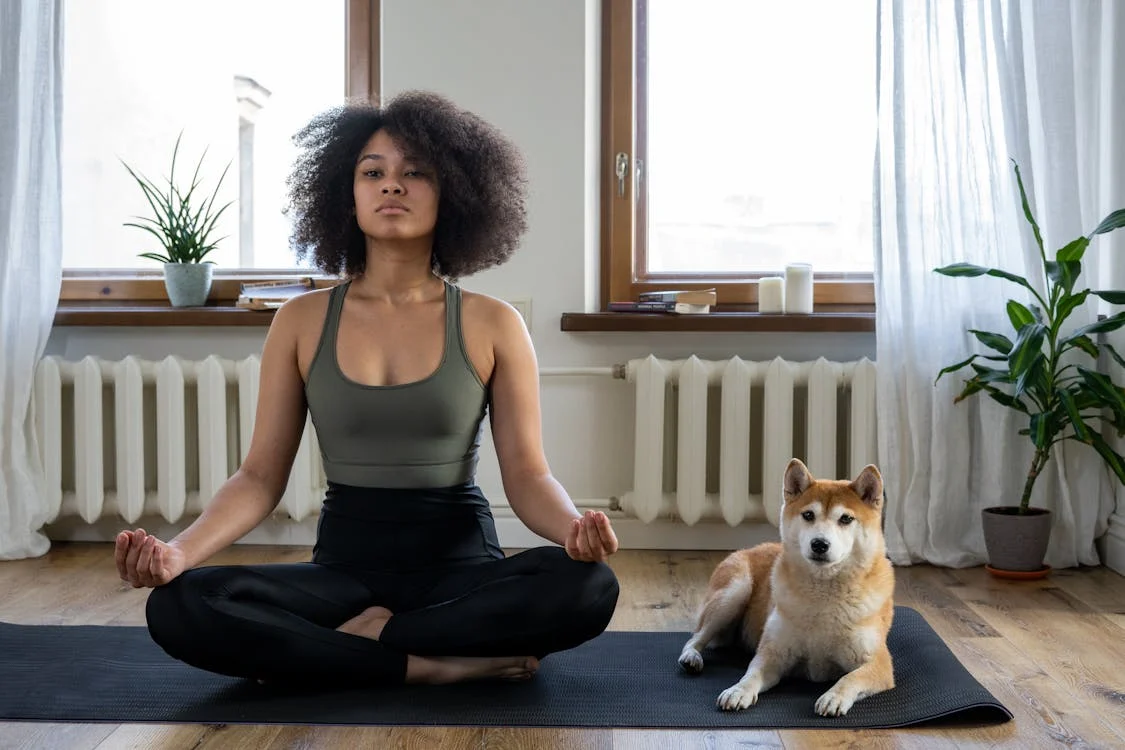 Confident woman in a bright, natural setting